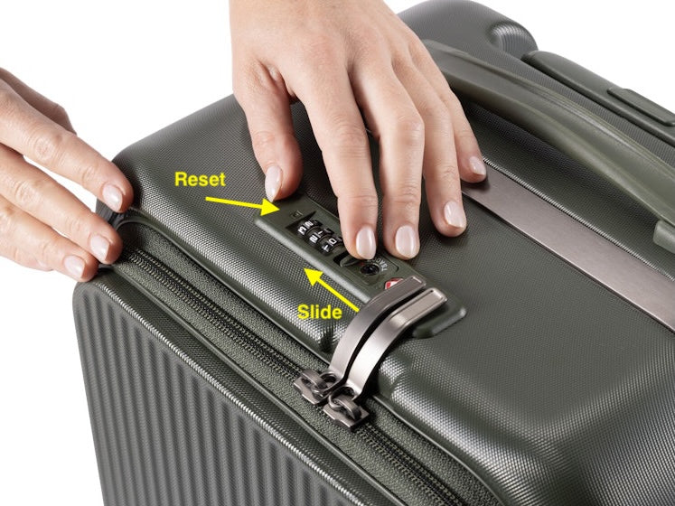 Flush-mounted TSA lock on the Glide Elite, showing the reset button and slide latch