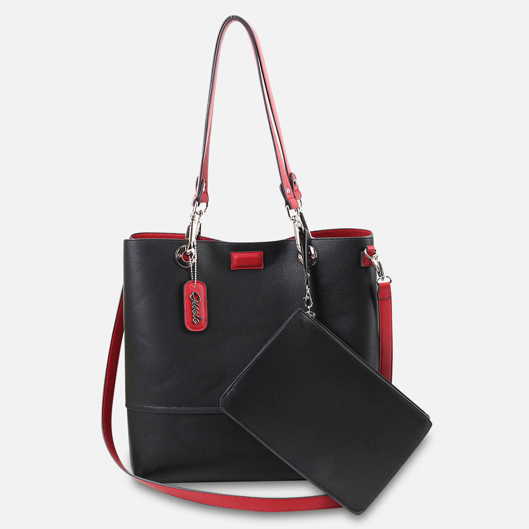 Gisele faux leather reversible black handbag with red details and strap#colour_scarletblk