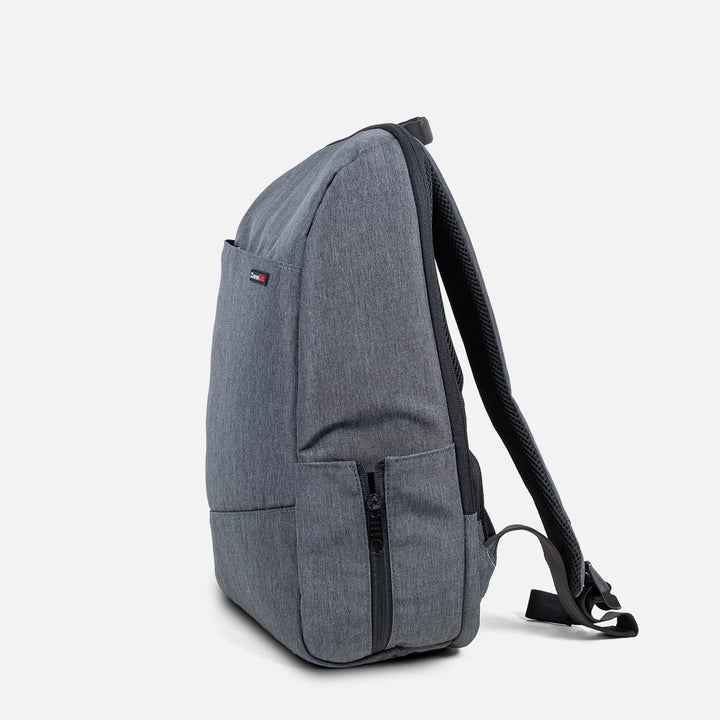 Side view of secure travel backpack with External zippered pocket - grey